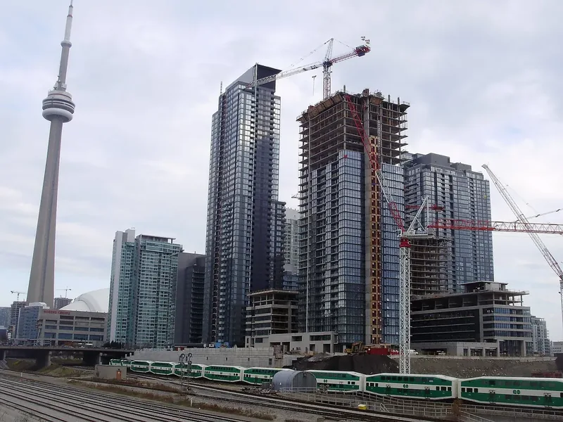 Residential towers under construction with tower cranes in downtown Toronto